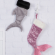 Stockings shaped like shark and mermaid tails
