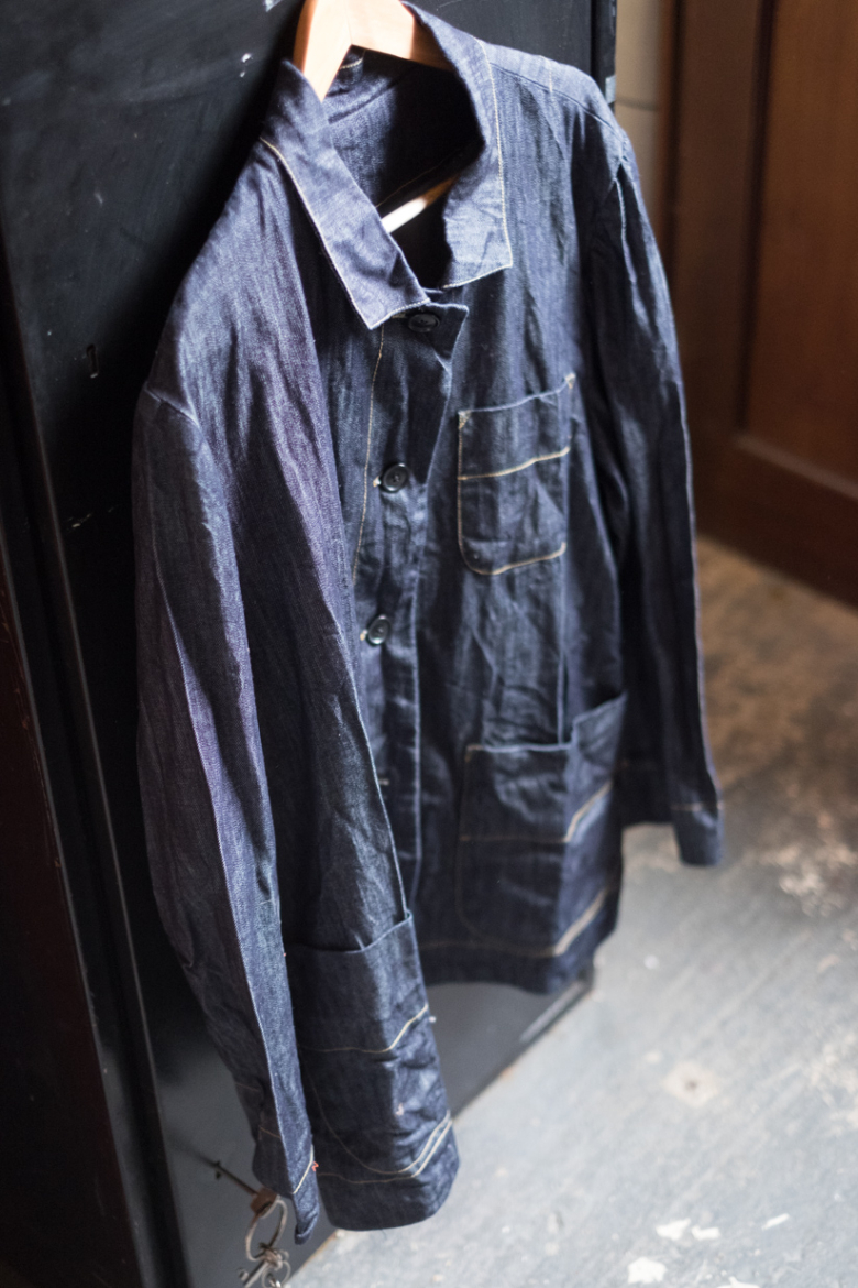 Garment in denim on hanger