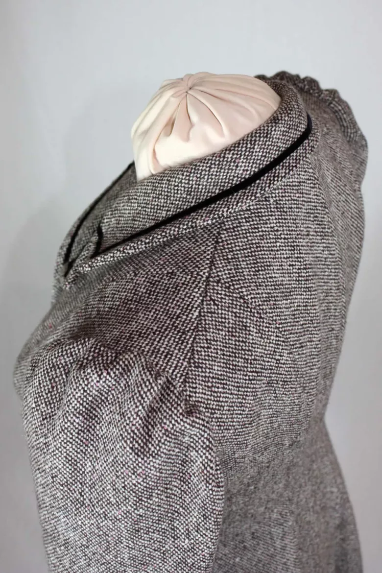 View of shoulder and neckline from the side and slightly overhead