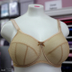 Beige bra on mannequin - front view