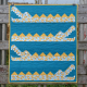 quilt hanging on wall