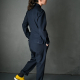 Right side back view, dark blue twill, yellow shoes