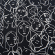 black fabric with faces outlined in white