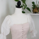 pink and white blouse with puffy white lace sleeves