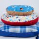 Three pet beds of different sizes stacked on top of each other