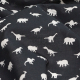 Black and off-white small dinosaur pattern fabric, close up.