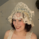 woman wearing a boudoir cap