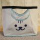 bag with a smily face