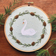 Swan and wreath embroidery sample