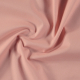 Antique pink-colored fabric, slightly twirled