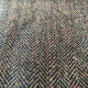 Brown and black herringbone tweed