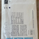 Back image of V1059 envelope including line drawings and pattern information