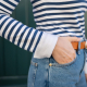 a striped long sleeved shirt with a white contrast cuffs