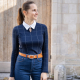 thin brunette woman wearing a navy long sleeved shirt with a white contrast collar