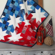 quilt draped on dresser