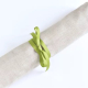 Needle case rolled up and closed with ribbon