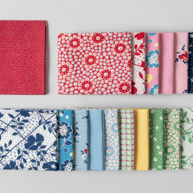 Fat quarters showing colors and patterns of 1930s Revival fabric collection