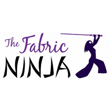 Black ninja figure with long hair wielding a sewing needle next to name The Fabric Ninja