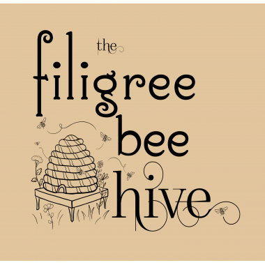 The Filigree Beehive logo, drawing of an old fashioned beehive surrounded by buzzing bees 