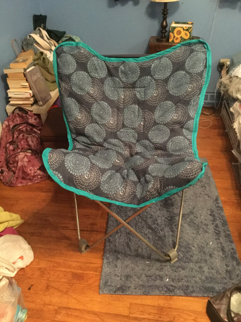 newly finished blue butterfly chair in bedroom